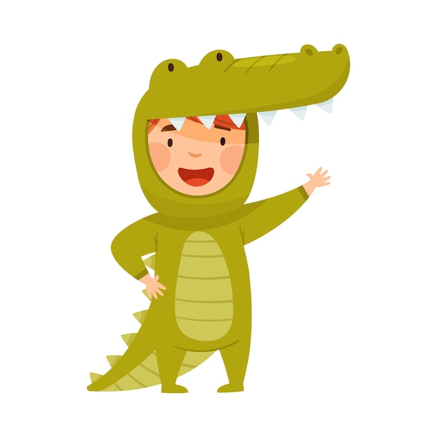 Niño pequeño con disfraz de cocodrilo agitando la mano y divirtiéndose Ilustración vectorial