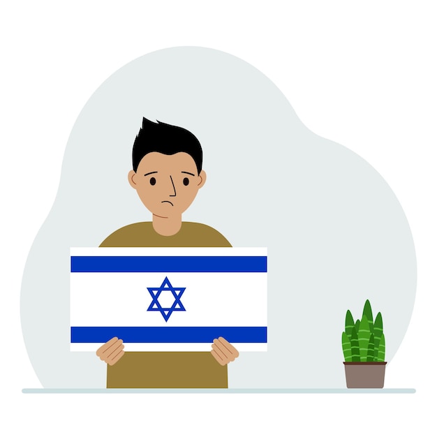 Un niño pequeño sostiene la bandera de Israel en sus manos El concepto de fiesta nacional de demostración o patriotismo Nacionalidad