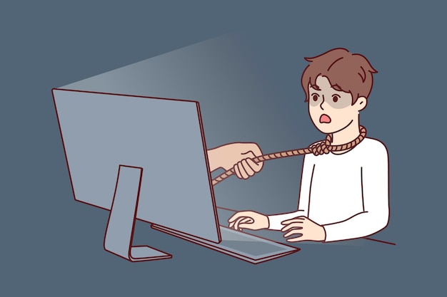 Un niño que sufre de adicción a Internet se sienta en una mesa con una computadora con una cuerda alrededor del cuello