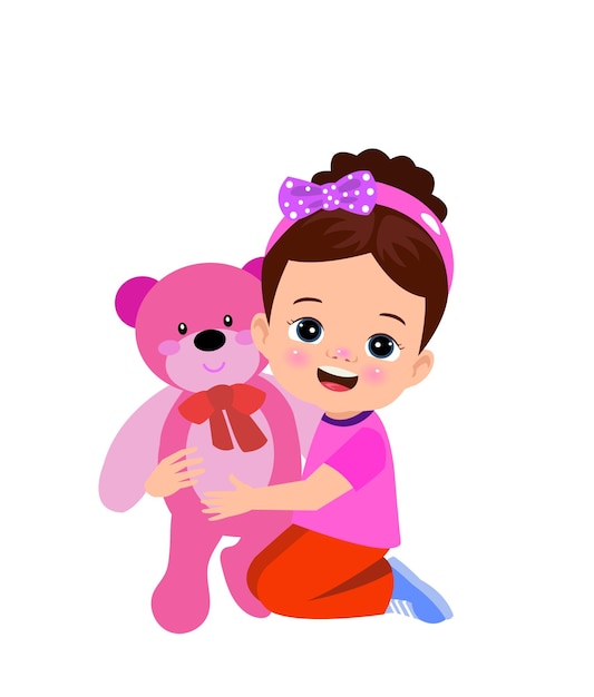 Un niño sostiene un oso de peluche.