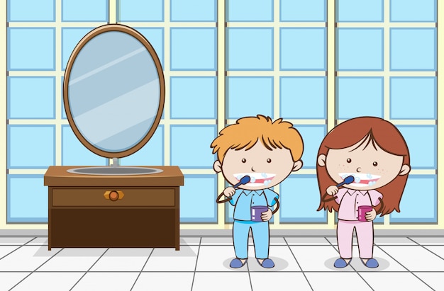 Niños cepillarse los dientes en el baño