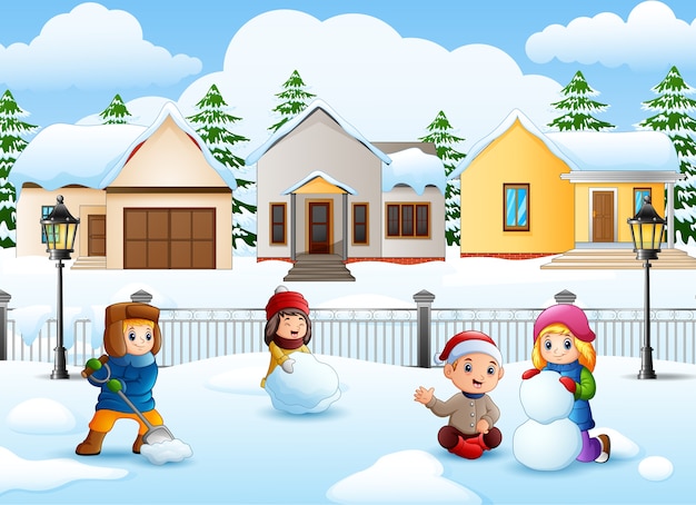 Niños de dibujos animados jugando en el pueblo nevado | Vector Premium