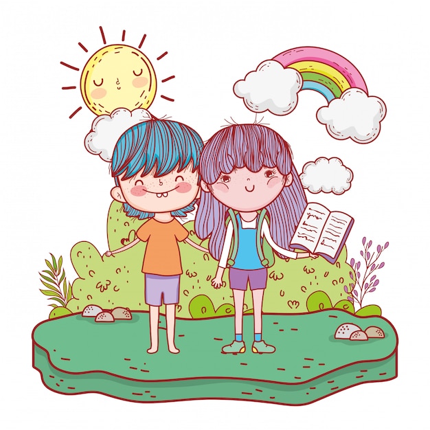 Niños felices leyendo libros en el paisaje