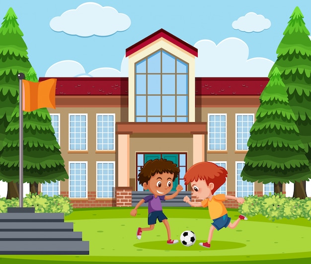 Niños jugando al fútbol en la escuela