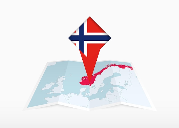 Noruega está representada en un mapa de papel plegado y un marcador de ubicación fijado con la bandera de Noruega