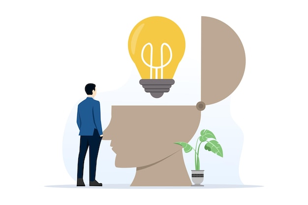 nuevo concepto de idea con el hombre de negocios mirando el símbolo de la cabeza humana con la lámpara de idea