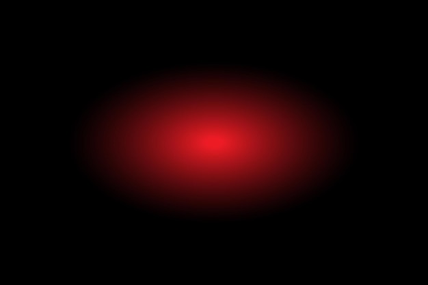 un objeto rojo que está en la oscuridad