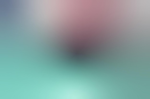Un objeto rosado borroso con un fondo azul