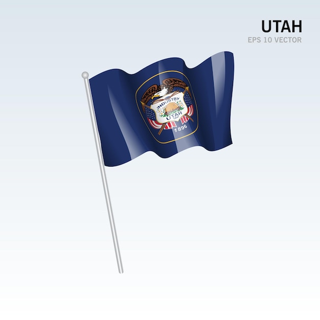 Ondeando la bandera del estado de utah de los estados unidos de américa sobre fondo gris