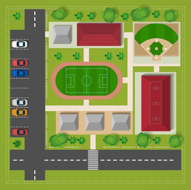 Opinión superior del estadio de fútbol del aparcamiento con los coches y los árboles.