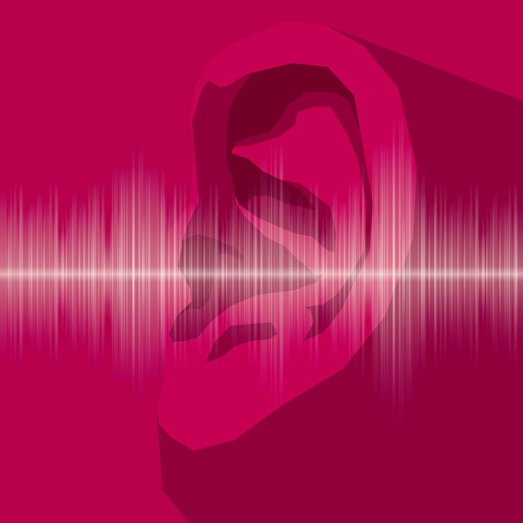 Vector orejas dibujadas por vectores, prueba de audición. el fondo es rojo.