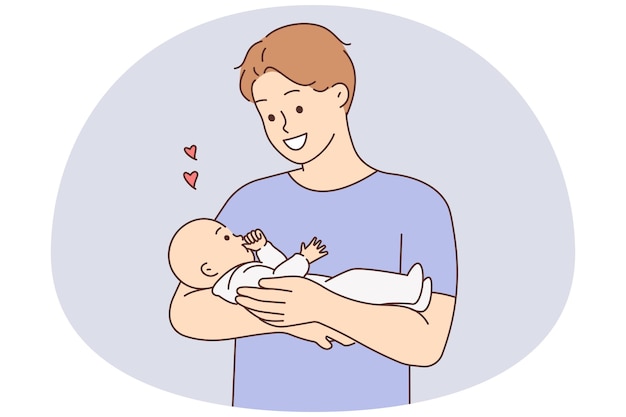 Padre feliz sosteniendo al bebé en brazos