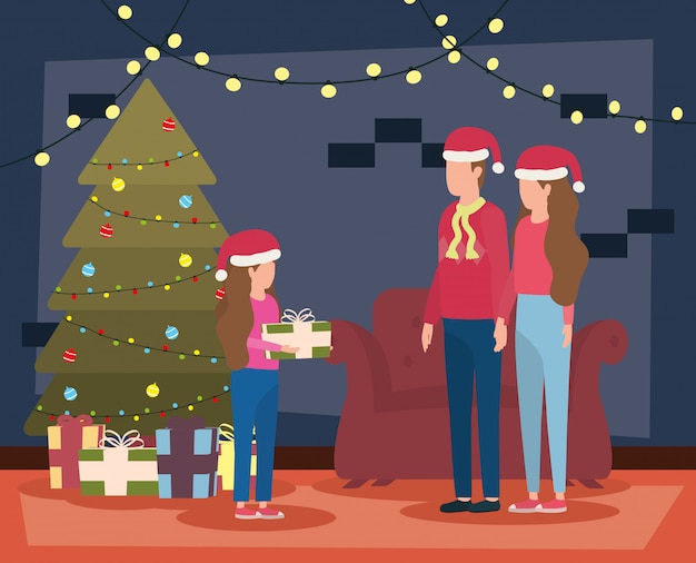 padres e hija celebrando la navidad en el salón con árbol