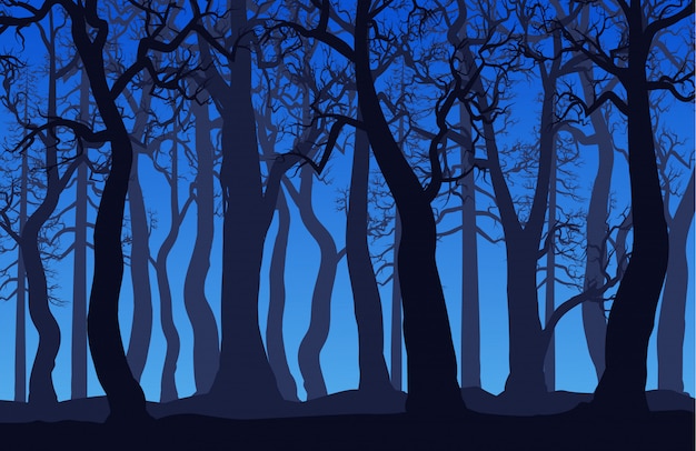 Paisaje forestal con árboles muertos en la noche