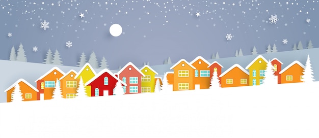 Paisaje invernal con casas de colores
