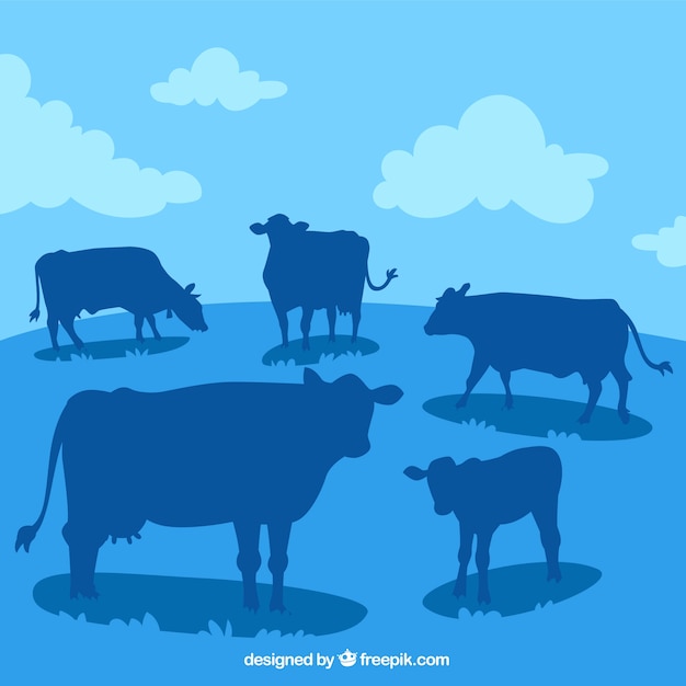 Vector paisaje con muchas siluetas de vaca