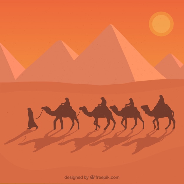 Paisaje de pirámides planas de Egipto con caravana de camellos