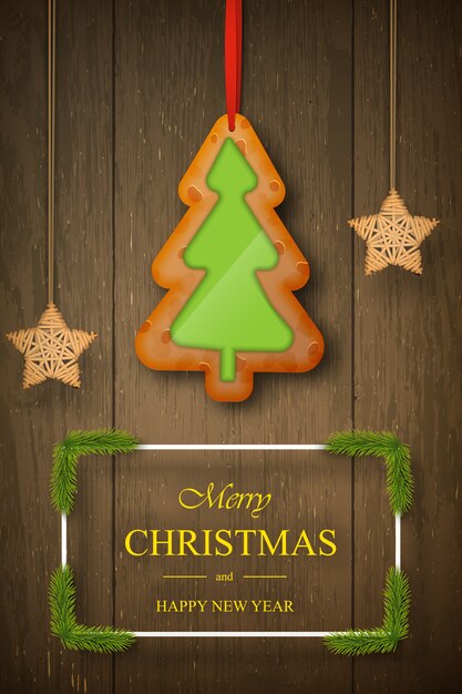 Pan de jengibre de Navidad en madera oscura con deseos, ramas de pino.