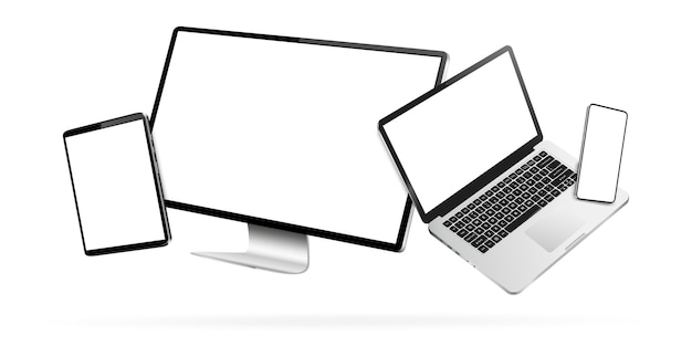 Pantalla de computadora portátil, tablet PC y teléfono móvil mientras levita en el aire sobre un fondo blanco