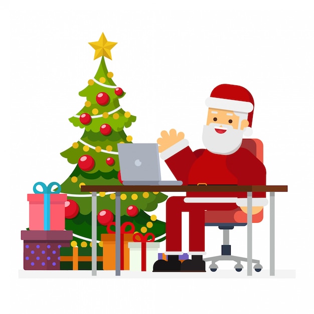 Papá Noel moderno trabajando en su computadora portátil