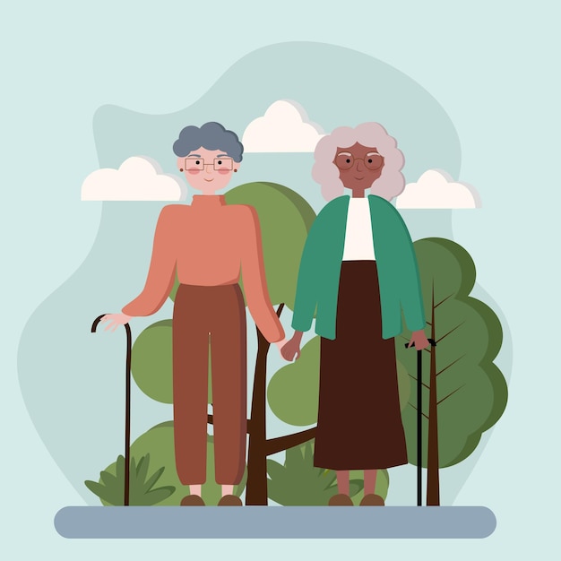 Un par de abuelas multirraciales felices caminando cogidas de la mano