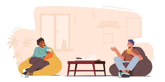 Par de amigos sentados en el sofá, bebiendo té
