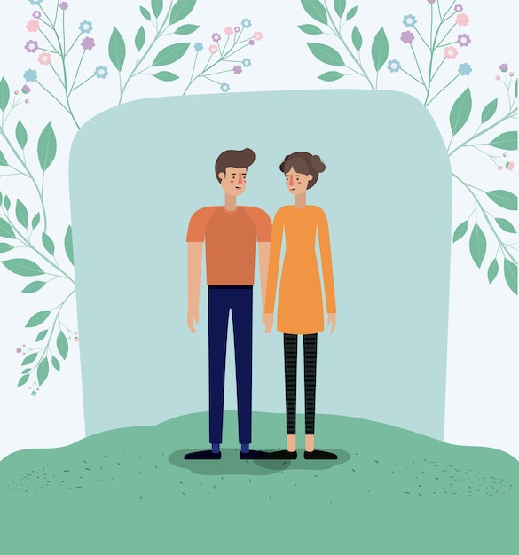 pareja de amantes en el césped con marco de hojas