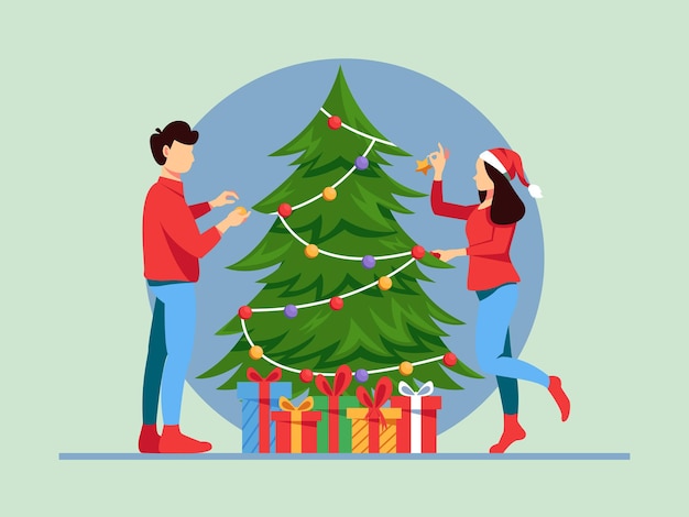 Pareja decora un árbol de navidad