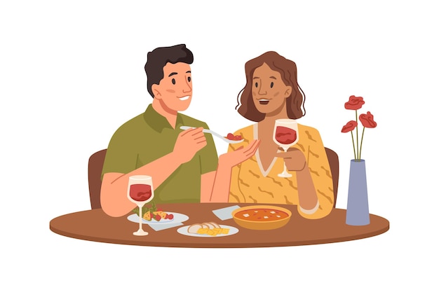 Pareja de hombre y mujer cenando en el restaurante