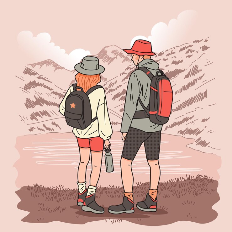 Pareja mirando la vista de la montaña mientras camina