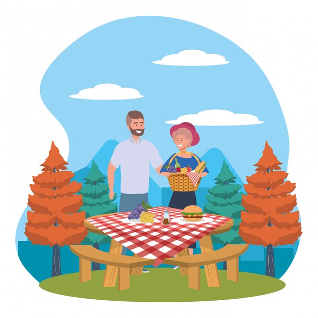 Pareja de mujer y hombre haciendo picnic