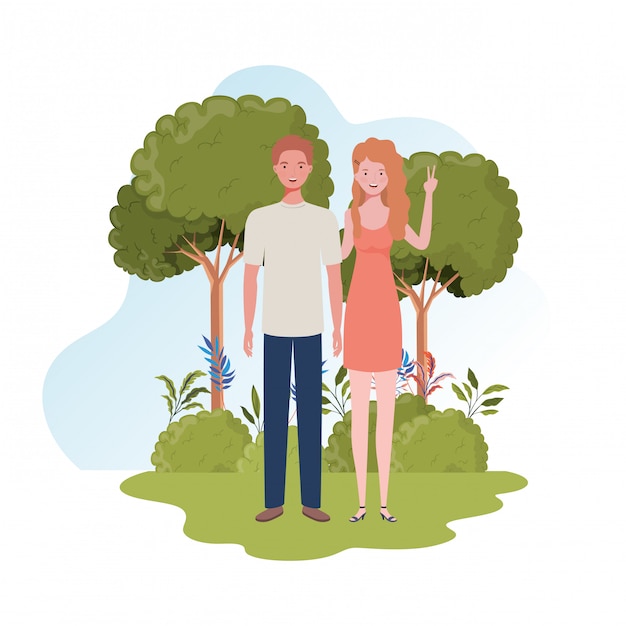 Pareja de personas de pie con paisaje