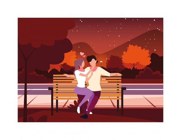Pareja de personas sentadas en la silla del parque