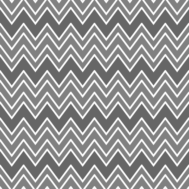 Patrón abstracto sin fisuras con líneas en zigzag formando adornos geométricos en patrón de chevron de colores grises