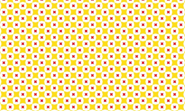 un patrón amarillo y blanco con un diamante rojo y blanco