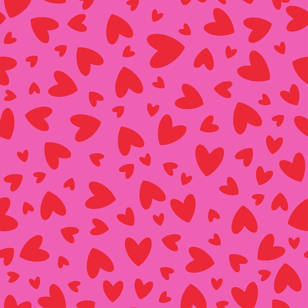 Patrón brillante sin costuras con corazones rojos en un fondo rosado para la impresión festiva del Día de San Valentín