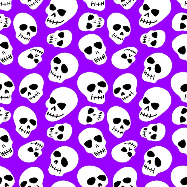 Patrón de calavera calaveras sobre un fondo morado