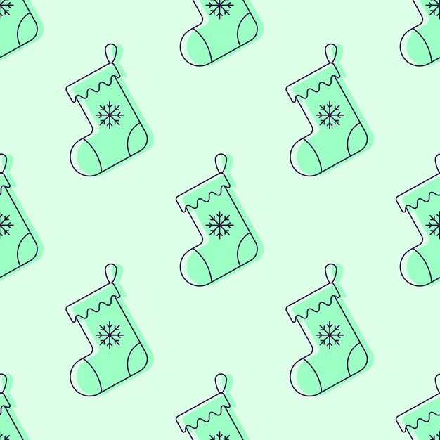 Patrón de calcetín de Navidad sobre fondo verde claro