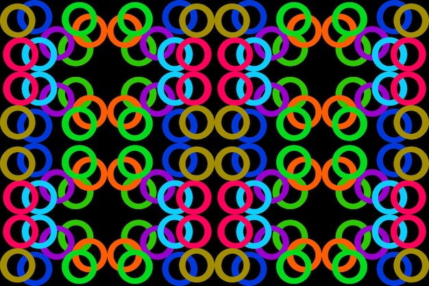 un patrón colorido de círculos con un fondo negro