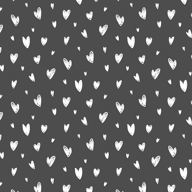 Patrón sin costuras con corazones gráficos dibujados a mano sobre fondo gris Patrón decorativo