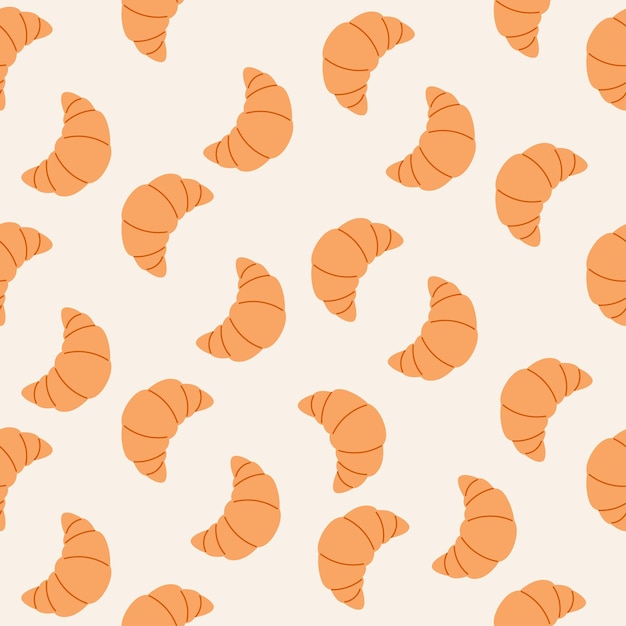 Patrón sin costuras de croissants dibujado a mano