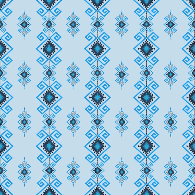 un patrón sin costuras de formas geométricas azules y blancas sobre un fondo azul