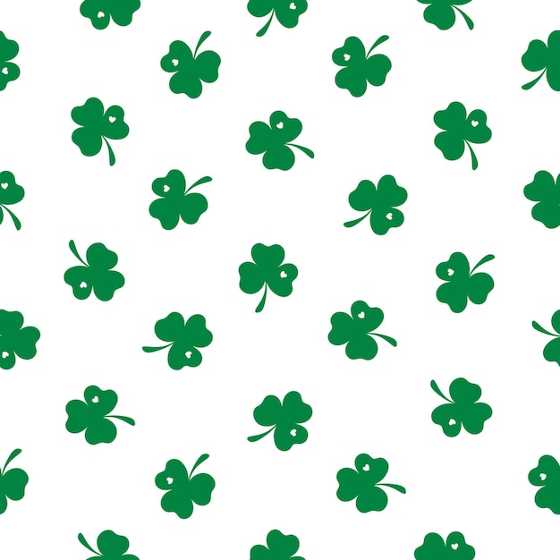Patrón sin costuras con un pequeño trébol verde sobre un fondo blanco Vector del Día de San Patricio Feliz