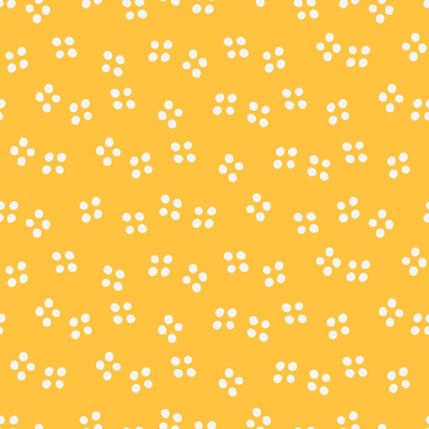 Patrón sin costuras de puntos blancos con fondo amarillo.