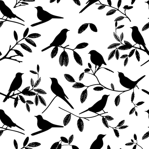 El patrón sin costuras de las siluetas de los pájaros posados en las ramas