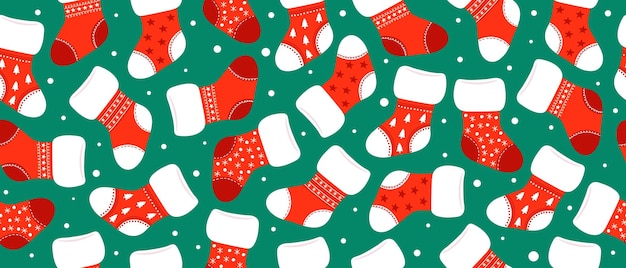 Patrón festivo sin costuras con calcetines navideños sobre un fondo verde