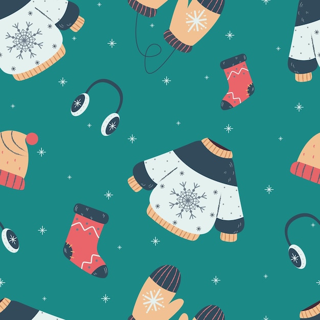 Patrón festivo con ropa de invierno sobre fondo turquesa para envolver papel, para imprimir