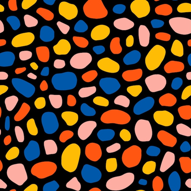 Patrón sin fisuras con guijarros de colores y fondo negro