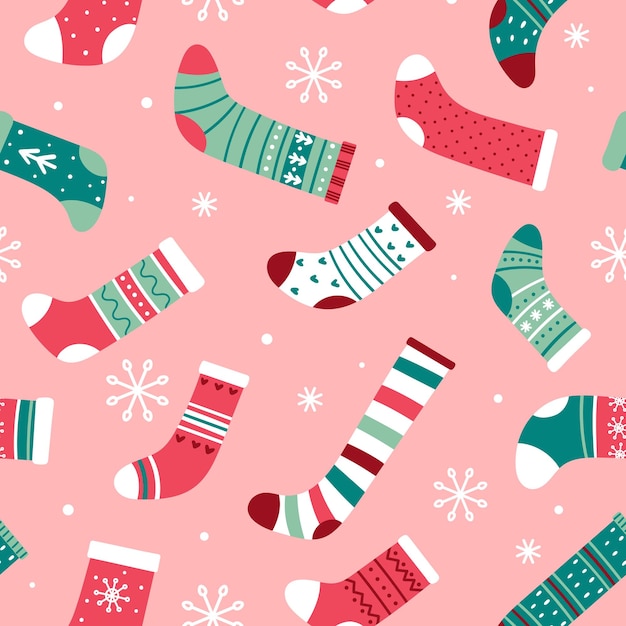 Patrón sin fisuras de Navidad con calcetines de Navidad brillantes y copos de nieve sobre un fondo rosa