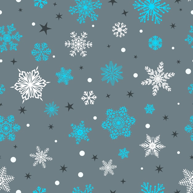 Patrón sin fisuras de Navidad de copos de nieve grandes y pequeños blanco y azul sobre gris